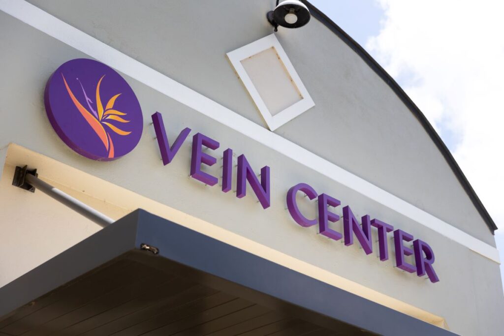 Outside shot of the center's sign where patients come to improve circulation in Sarasota
